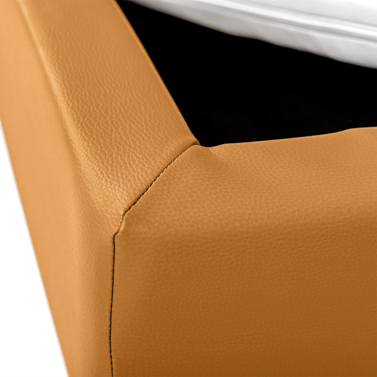 Eckdetail von Babybett oder Kinderbett aus Vollschaum bezogen mit Kunstleder in orange und einer hygienischen Matratze in Kunstleder weiß